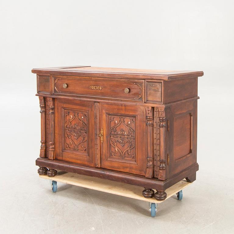 An early 1900s mahogany display cabinet.