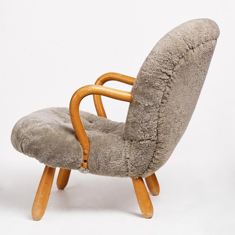 A Swedish Modern "Clam Chair", Sune Johanssons Möbelfabrik, Nässjö Sweden 1940-50's.