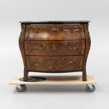 A rococo style parquetry and gilt-bronze mounted commode, circa 1900.