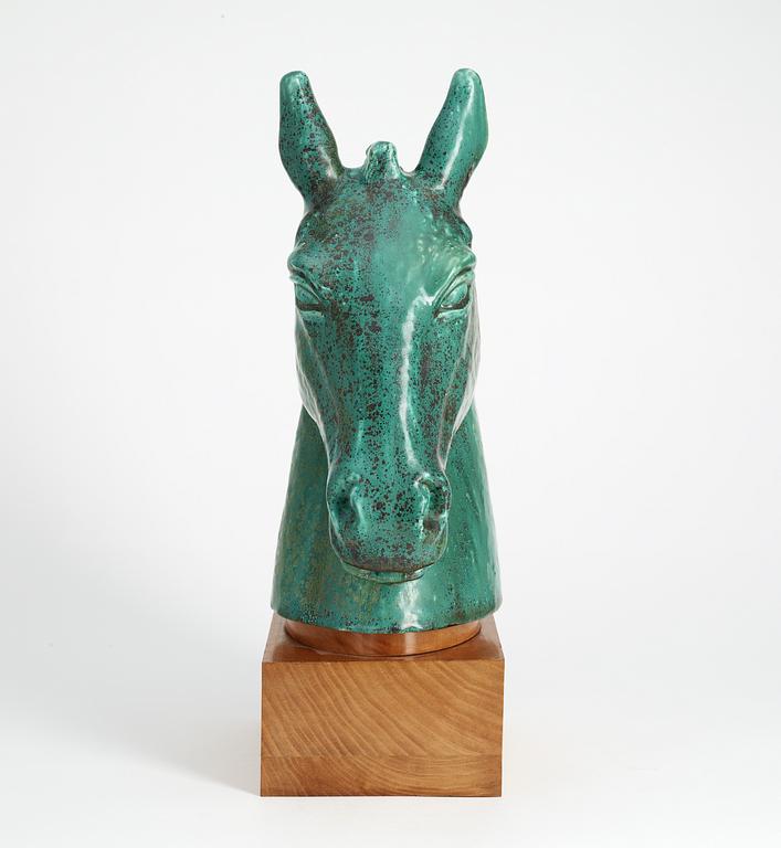 A Gunnar Nylund figure of a horse's head.