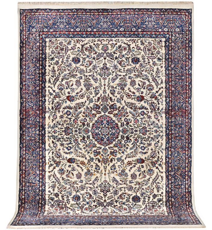An oriental carpet, c. 308 x 220 cm.