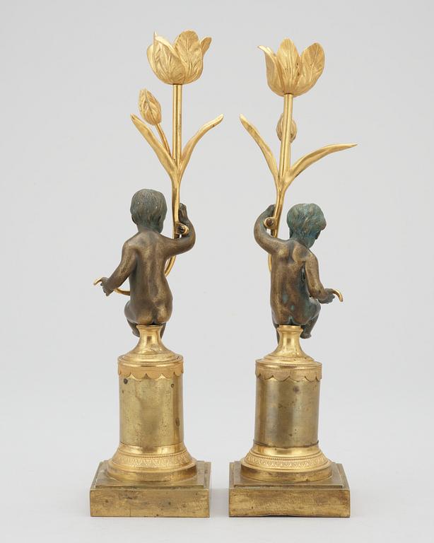 A pair of Louis XVI late 18th century candlesticks.