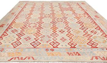 A Kilim carpet, c 391 x 317 cm.