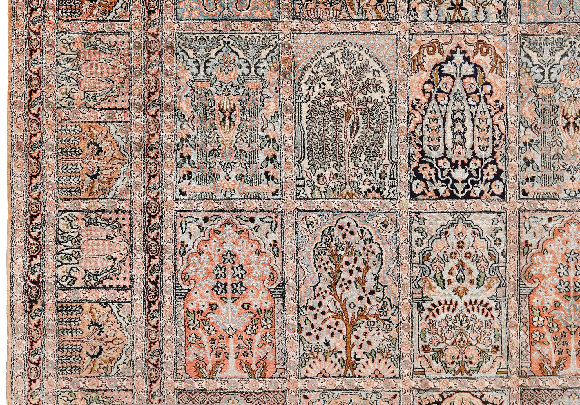 A silk Kashmir carpet, approx. 327 x 243 cm.