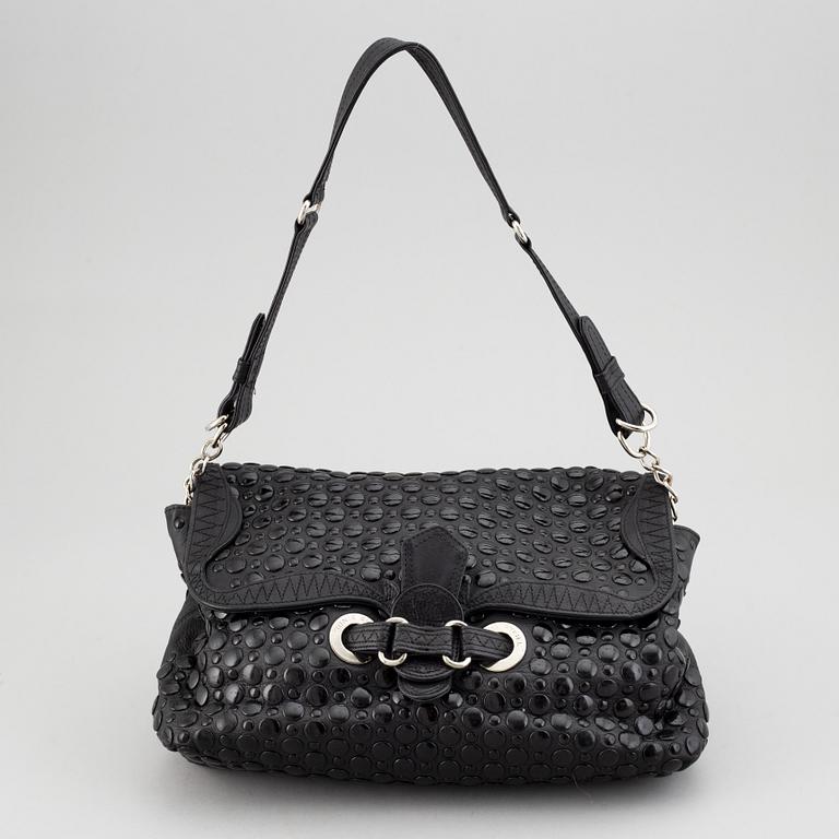 SONIA RYKIEL, a black leather bag.