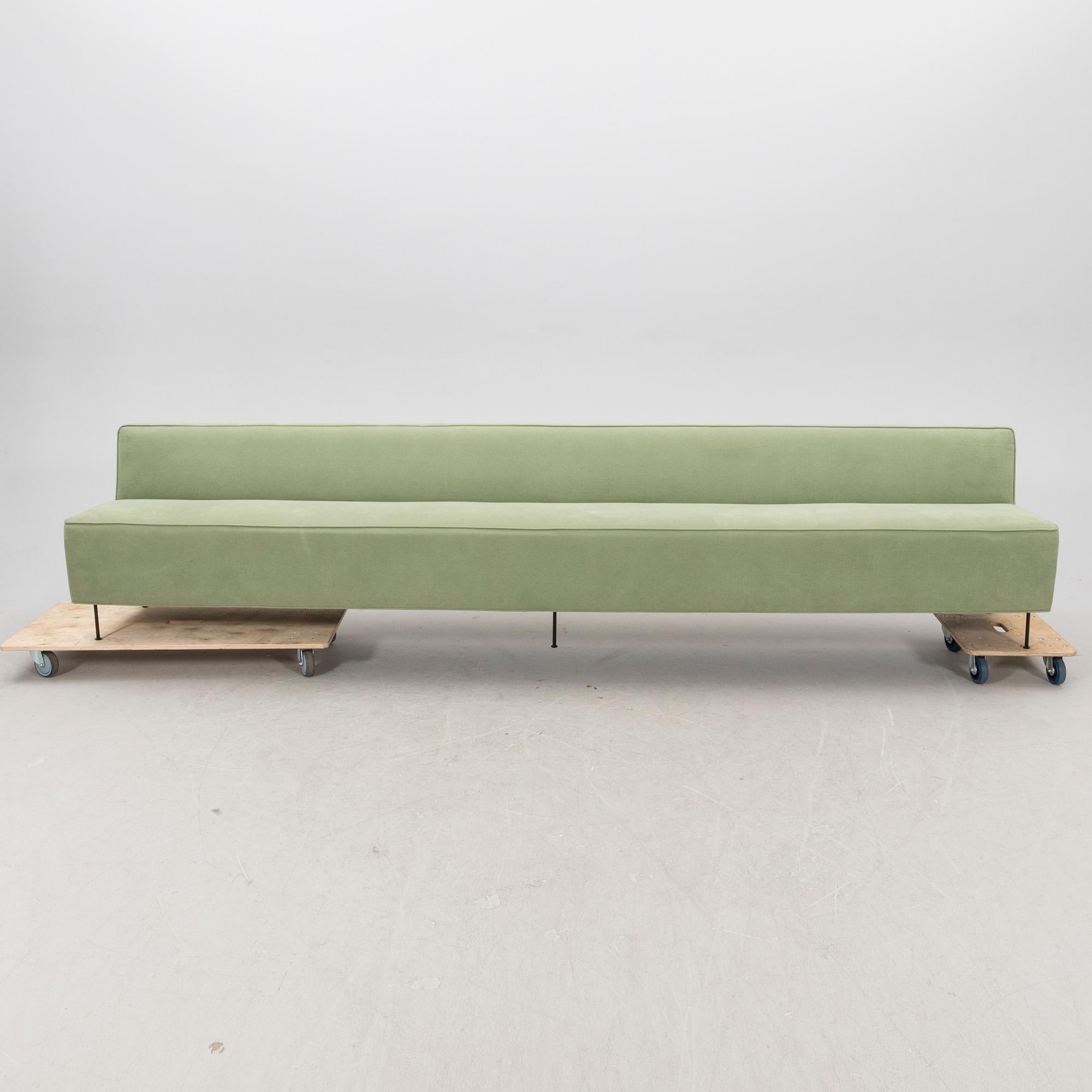 A sofa Modern Line' by Greta Magnusson Grossman, produced by Gubi, contemporary.