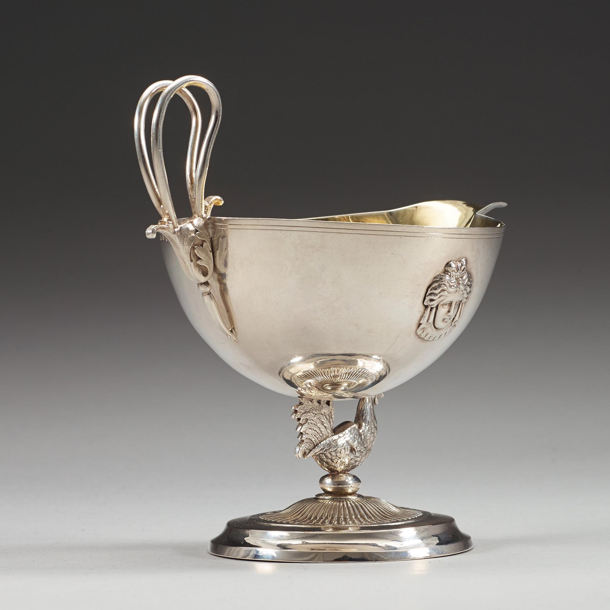 A Swedish 19th century parcel-gilt cream-jug, marks of Adolf Zethelius, Stockholm 1813.