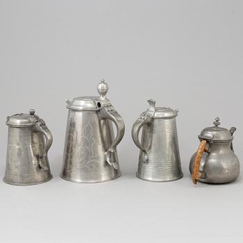 THREE PEWTER JUGS AND A TEAPOT, 19th century.