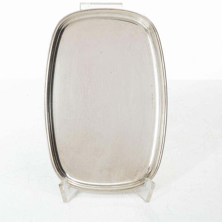 Salt and pepper shakers and tray, silver, including Henning Koppel for Georg Jensen, Denmark.