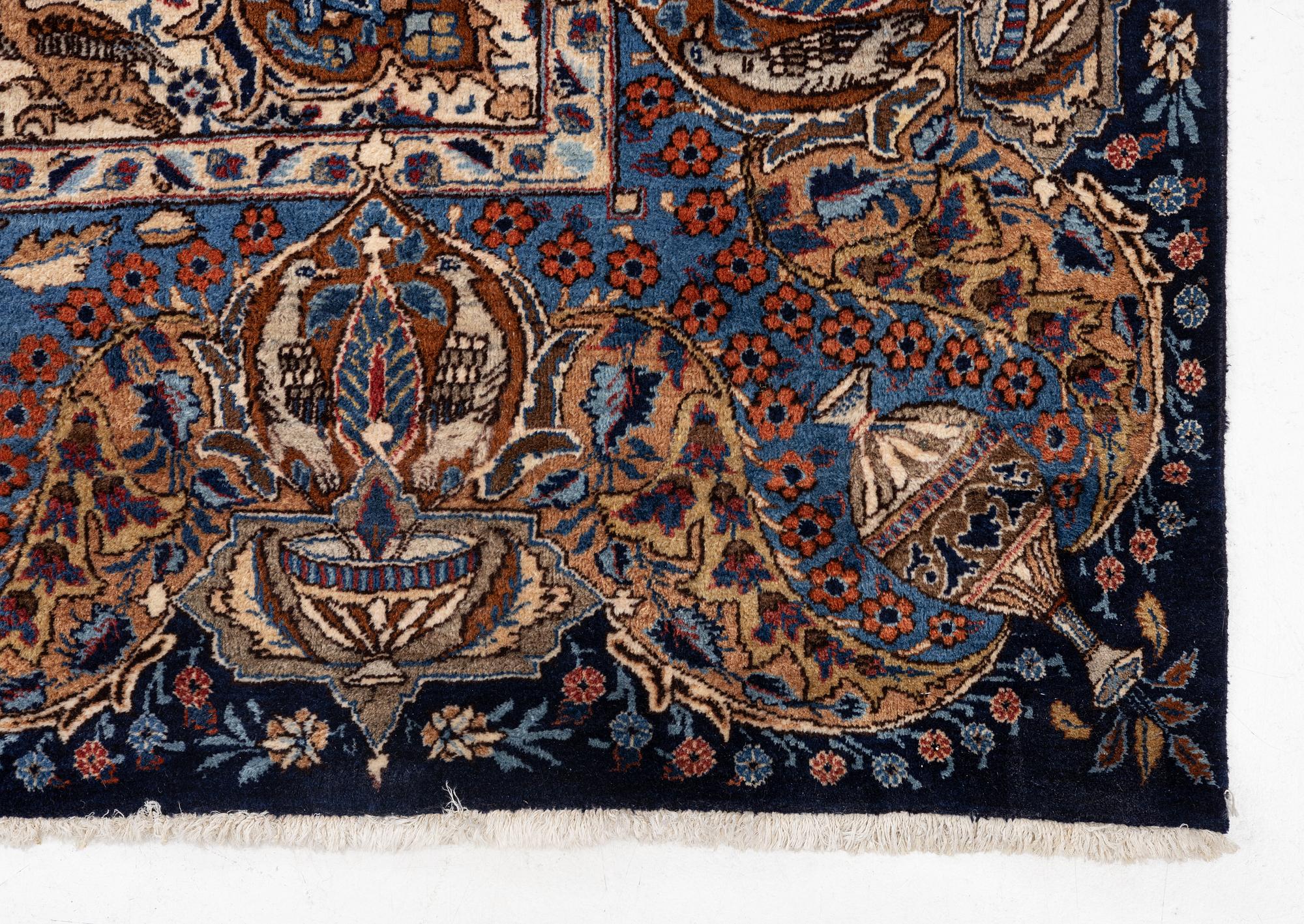 A Kashmar rug, c. 396 x 300 cm.