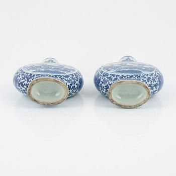 A matched pair of blue and white moon flasks, Qing dynasty, late 19th century.