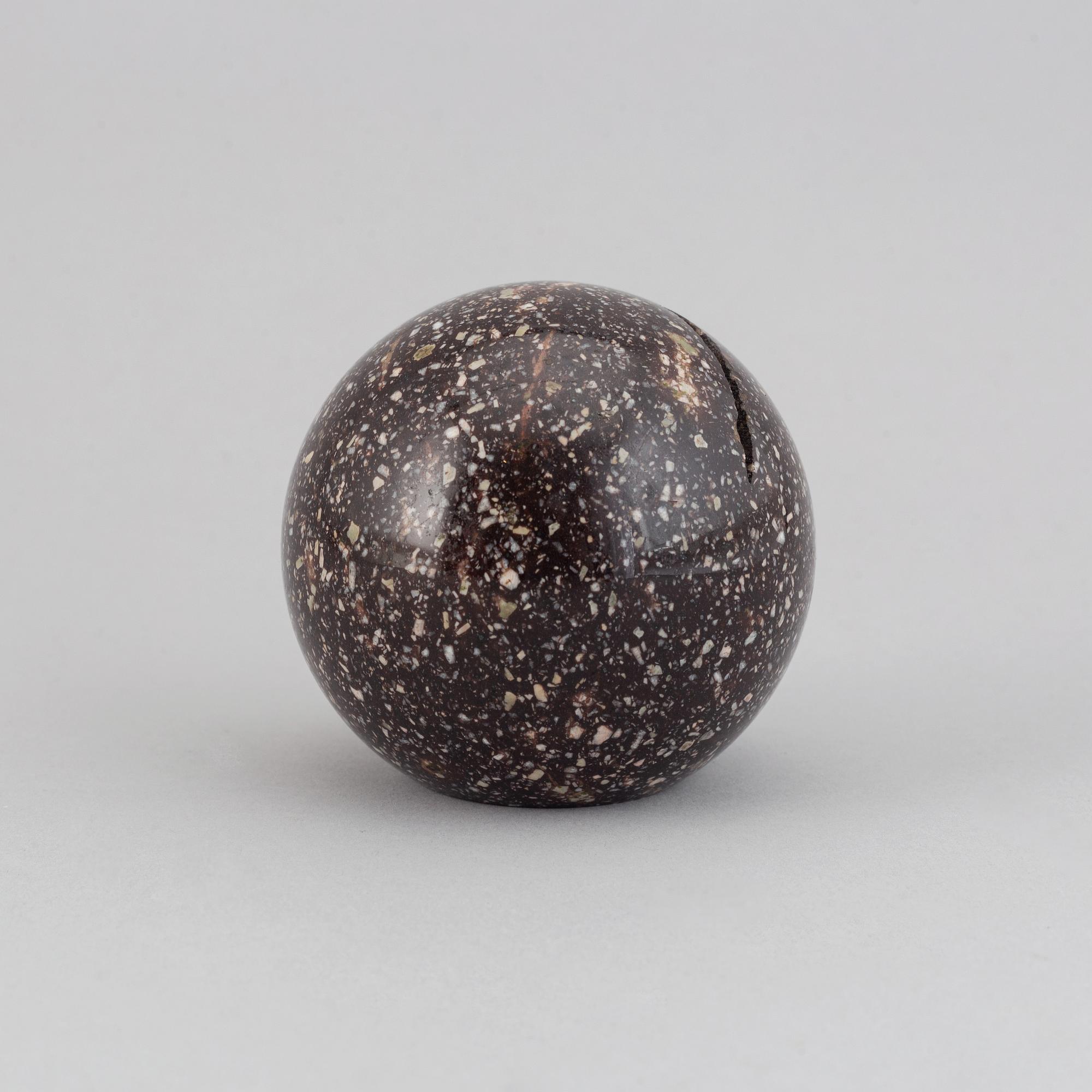 An early 20th century  porphyry paper weight.