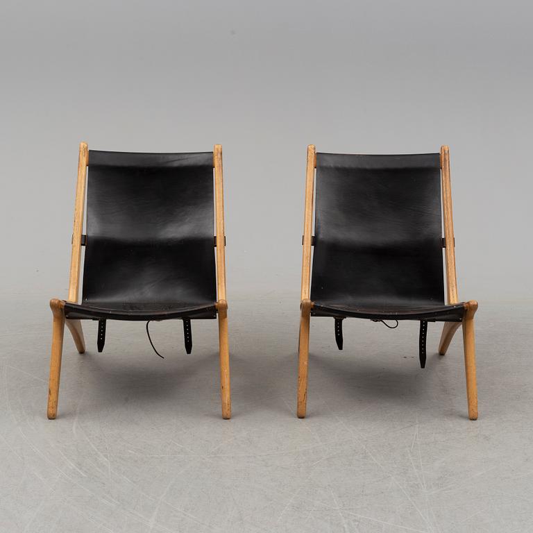 A pair of mid 20th century easy chairs by Östen Kristiansson for Luxus Vittsjö.