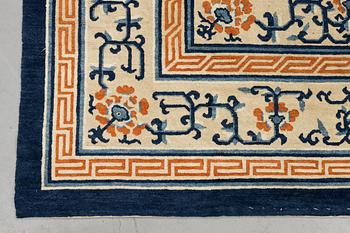 An antique Beijing carpet, measurement approx. 376 x 297 cm.