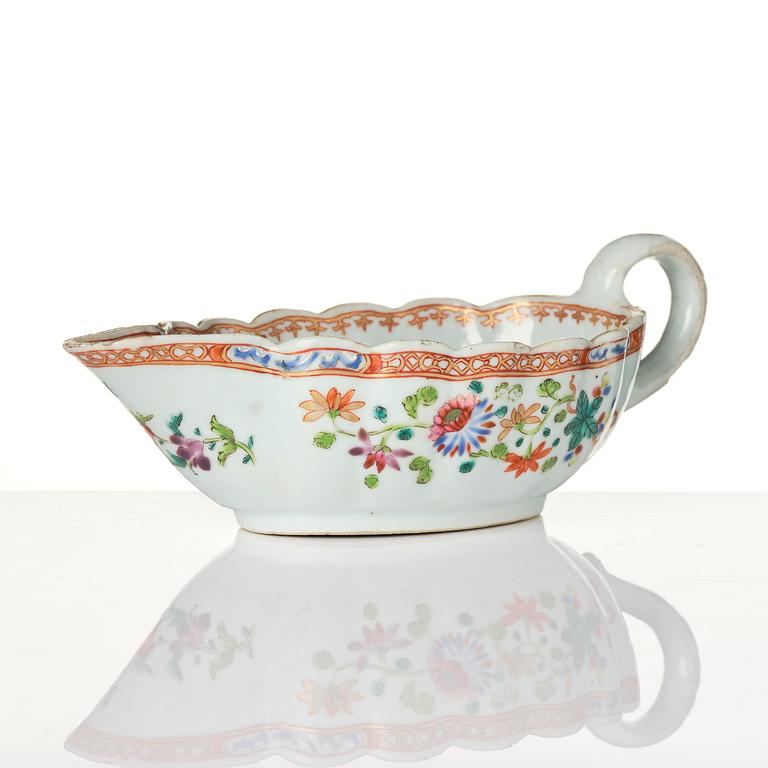 A group of famille rose 'double peacock' serving dishes, Qing dynasty, Qianlong (1736-95). (8 pieces).