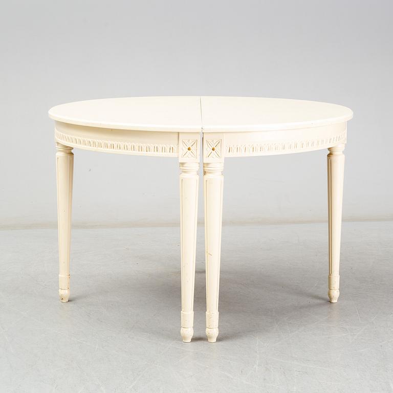 A Gustavian style dining table, second half of the 20th century. 3 leaves included.