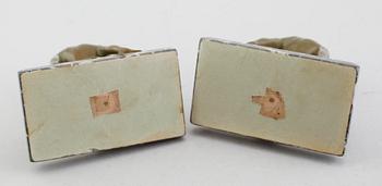 BOKSTÖD, 1 par, bronserad metall samt marmor, 1900-talets första hälft.