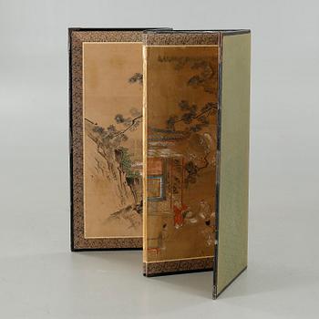 A chinese folding screen, first half of the 20th century.