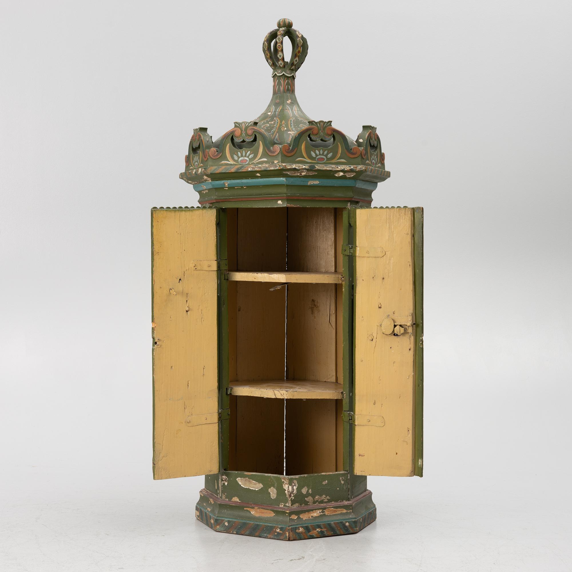 Corner cabinet, likely 18th century.