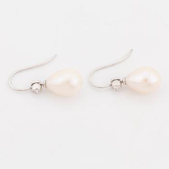 Cultured pearl and brilliant cut diamond earrings.