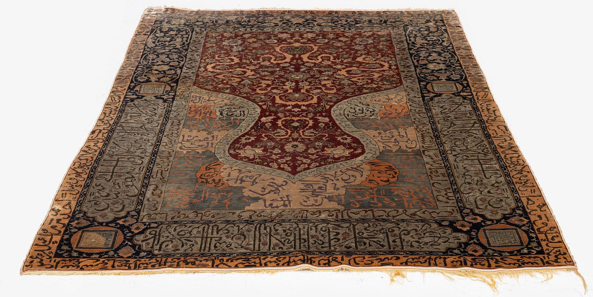 An antique silk rug, probably Istanbul, Turkey, c. 181 x 127 cm.