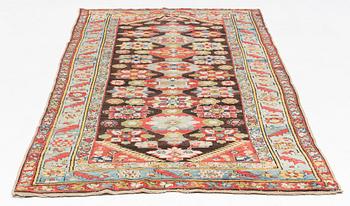 An antique Karabagh carpet,  ca 330 x 157 cm (one end with 1-3 cm flat weave).