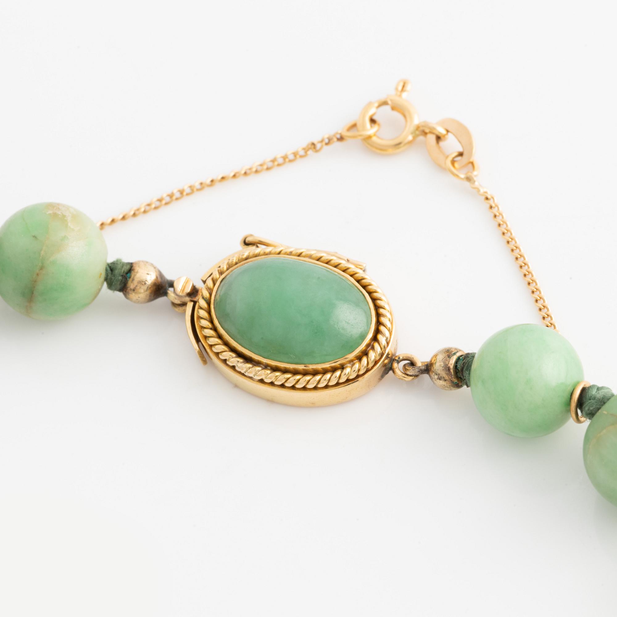 Necklace and a pair of earrings.