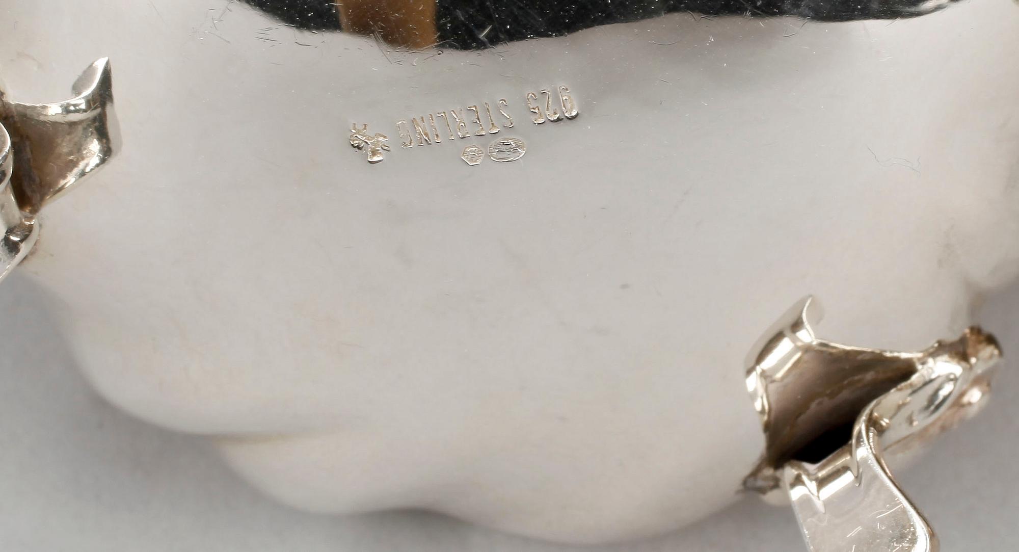 SOCKERSKRIN samt KANNA, silver, 1900-tal. Total vikt ca 315 gram.