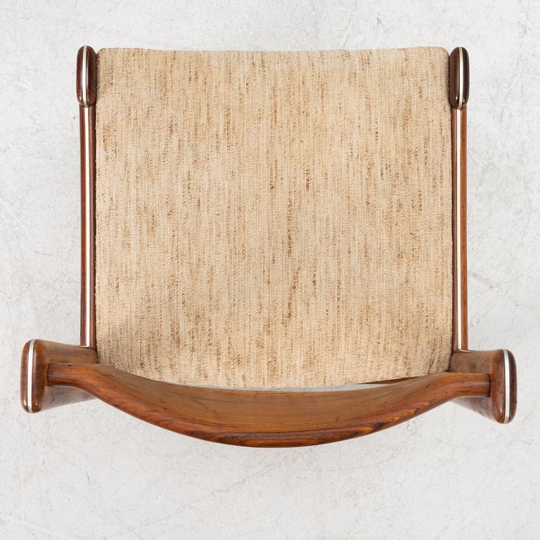 A dining table and six chairs, Uldum Møbelfabrik, Denmark, 1960's/70's.