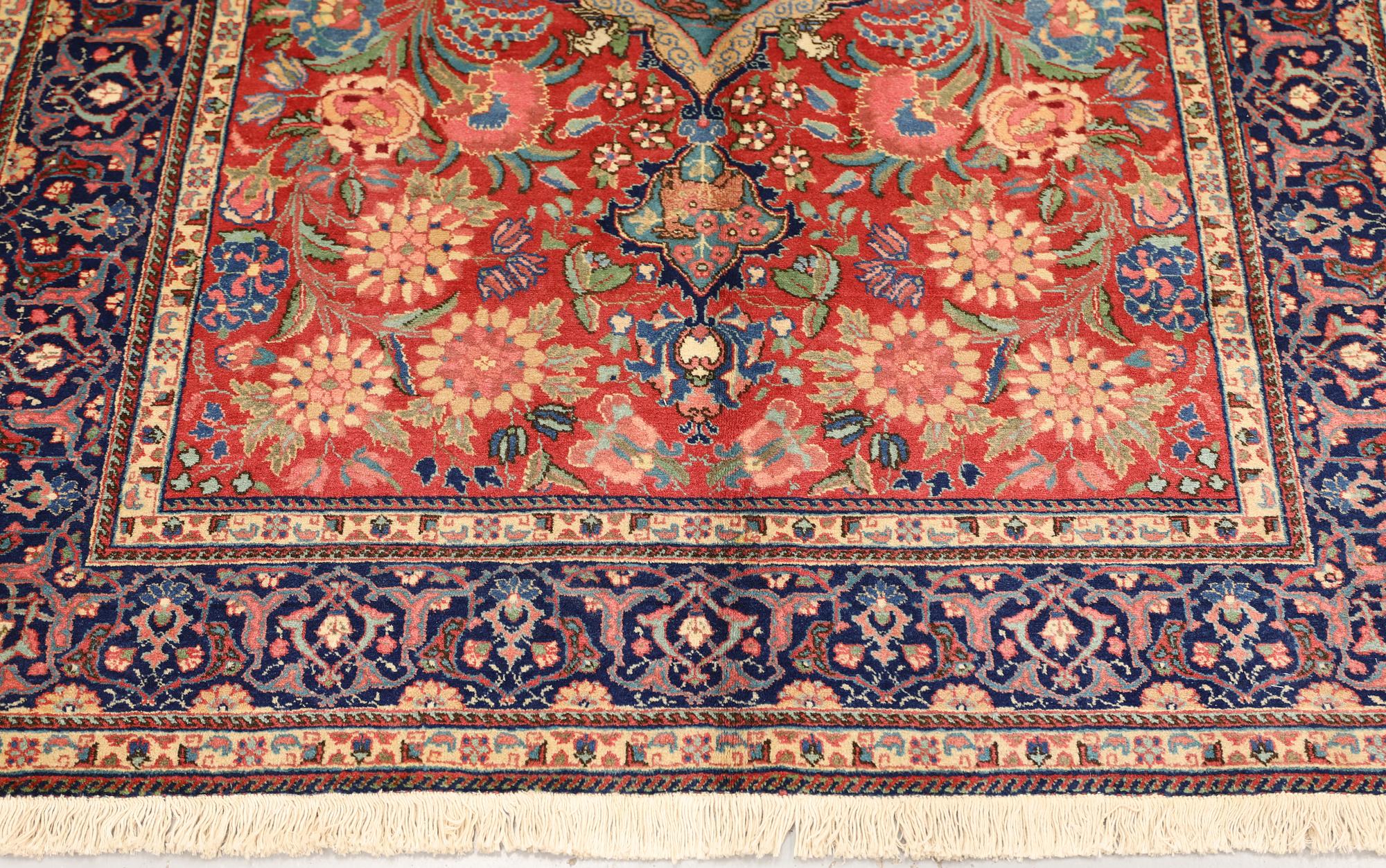 A semi-antique Tabriz carpet, c. 196 x 141 cm.