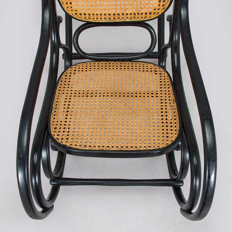 A mid-20th century Thonet style rocking chair.