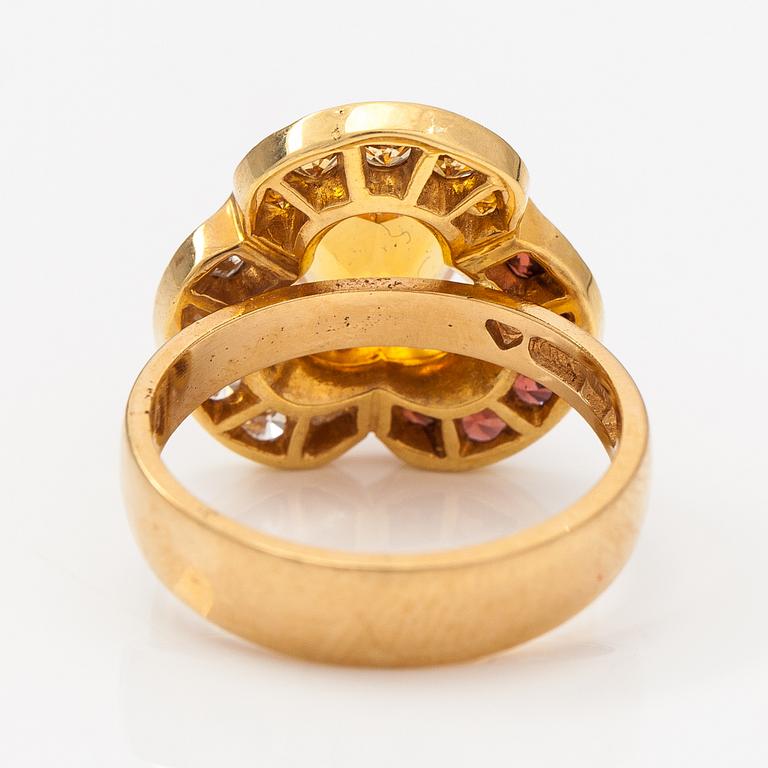 An 18K gold ring "Karin Månsdotter" with citrines and diamonds ca 0.26 ct in total. Ofelia Jewelry, Helsinki 1998.