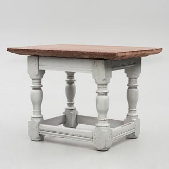 A limestone-top table, Sweden, 18th century.