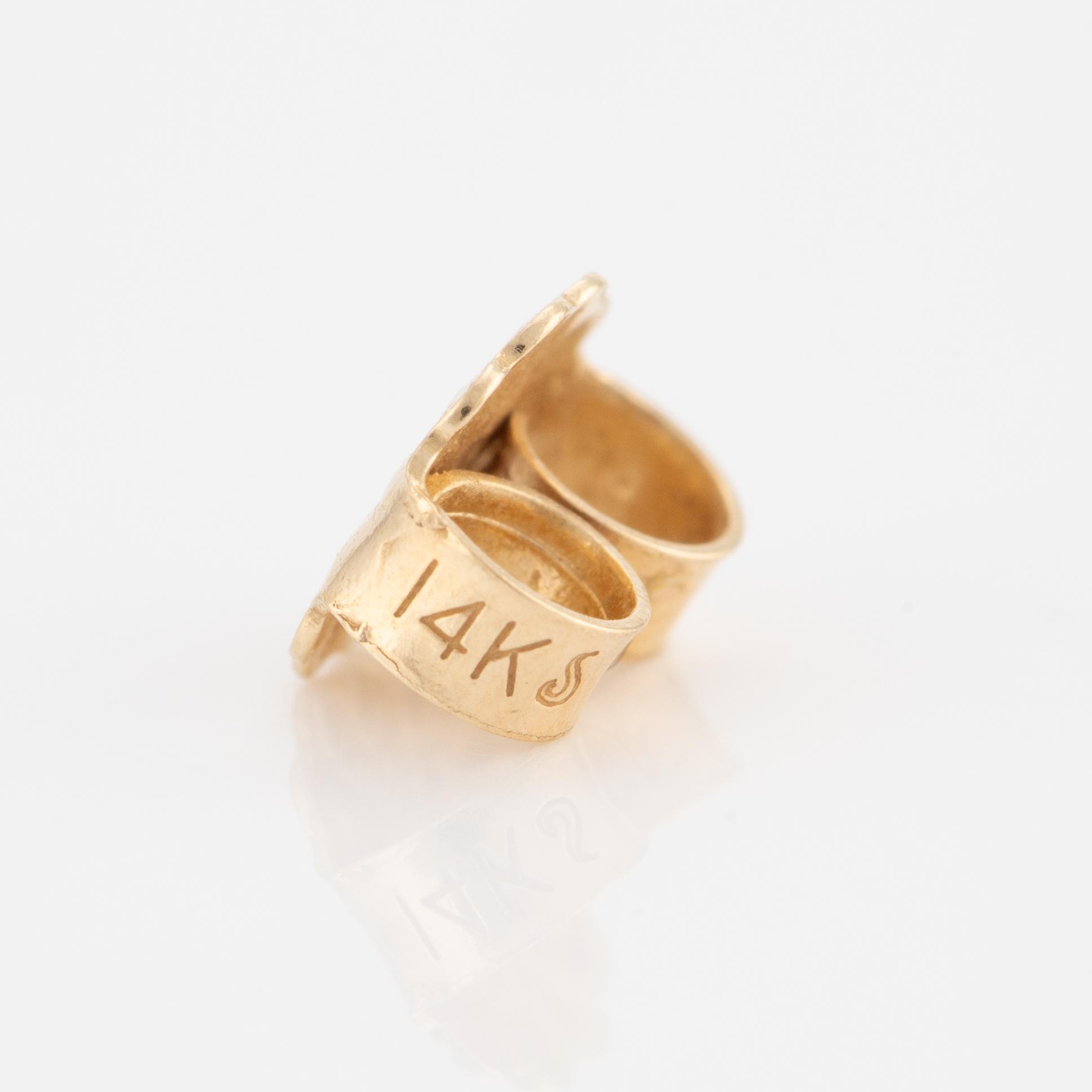 A pair of earrings in 14K gold set with round brilliant-cut diamonds.