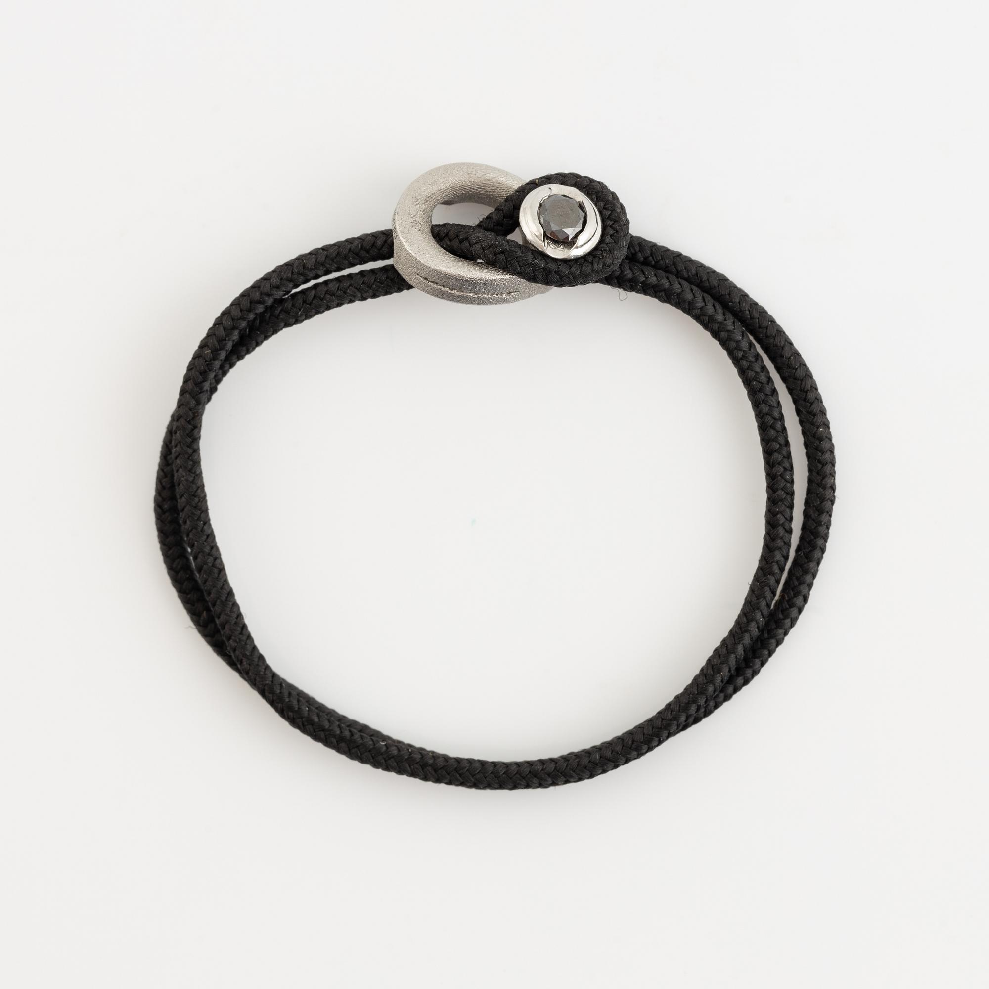 Håkan Orrling, Non Violence, bracelet with black diamond.