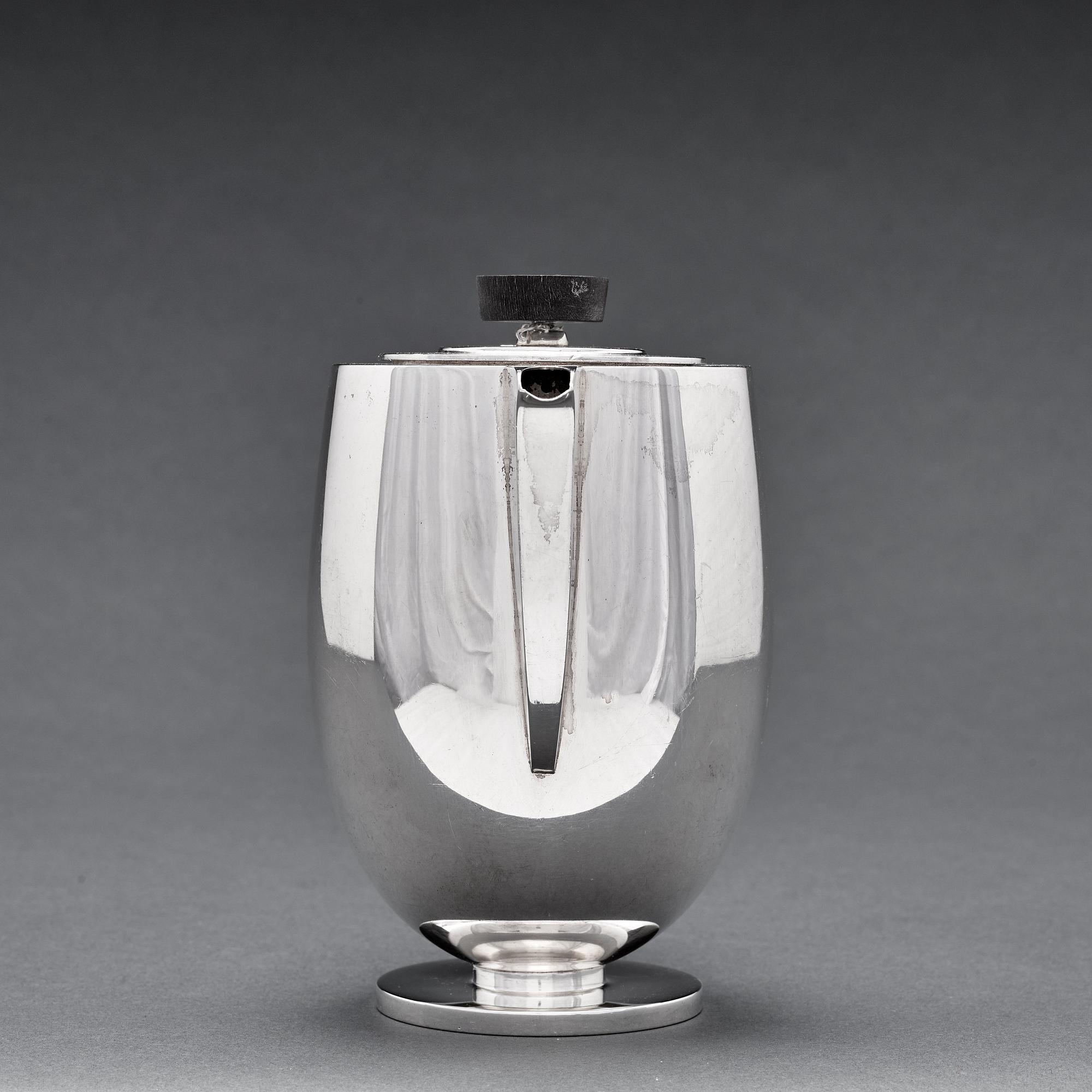 Guttorm Kristiansen (Gagnes), a four pieces 830/1000 silver tea- and coffee service, David-Andersen, Norway 1927-49.