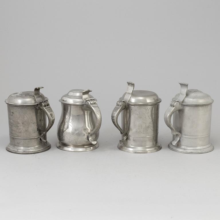 Four Swedish pewter tankards, 19th century.