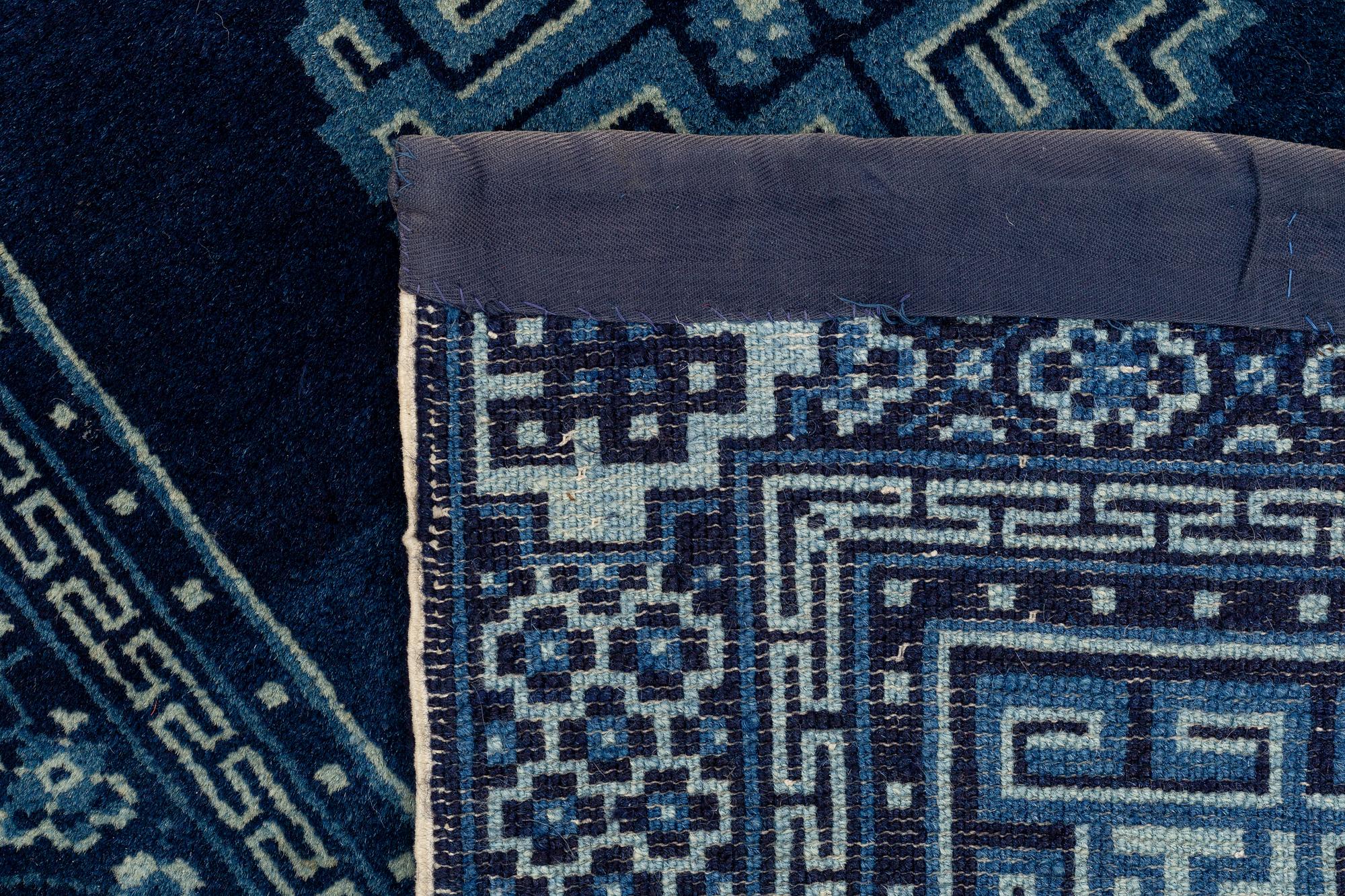 A rug, semi-antique Baotou, ca 121-122 x 59-61 cm.