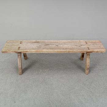 a 19th century pine bench.