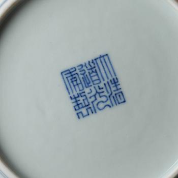 A set of nine blue and white lotus dishes, Qing dynasty with Daoguang seal mark.