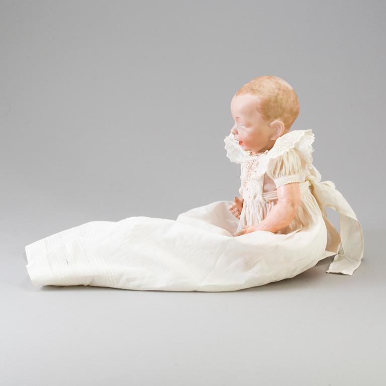 A bisque head character baby doll nr 100 by Kämmer & Reinhardt, Germany, 1909.