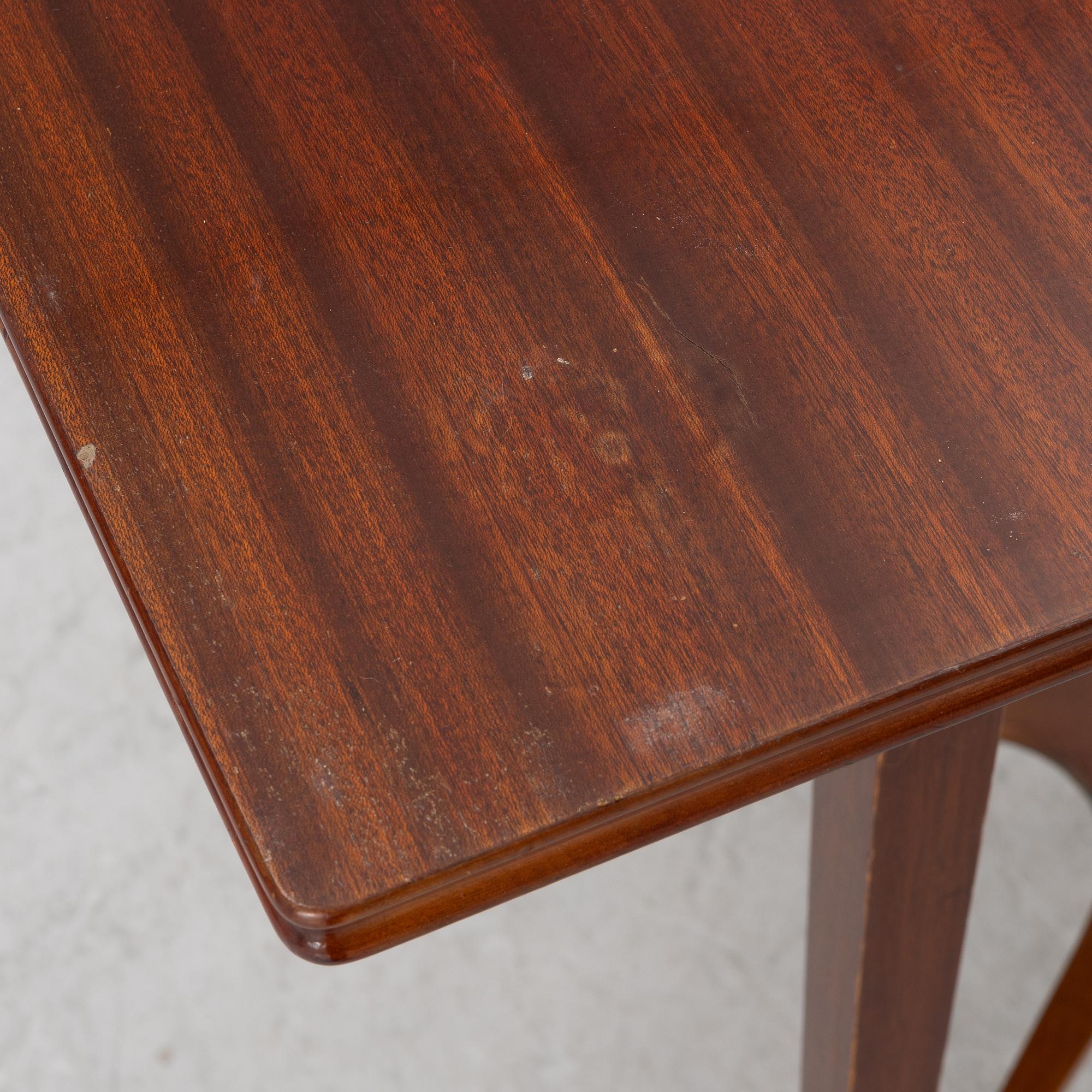 A late Gustavian style games table/sewing table, early 20th century.