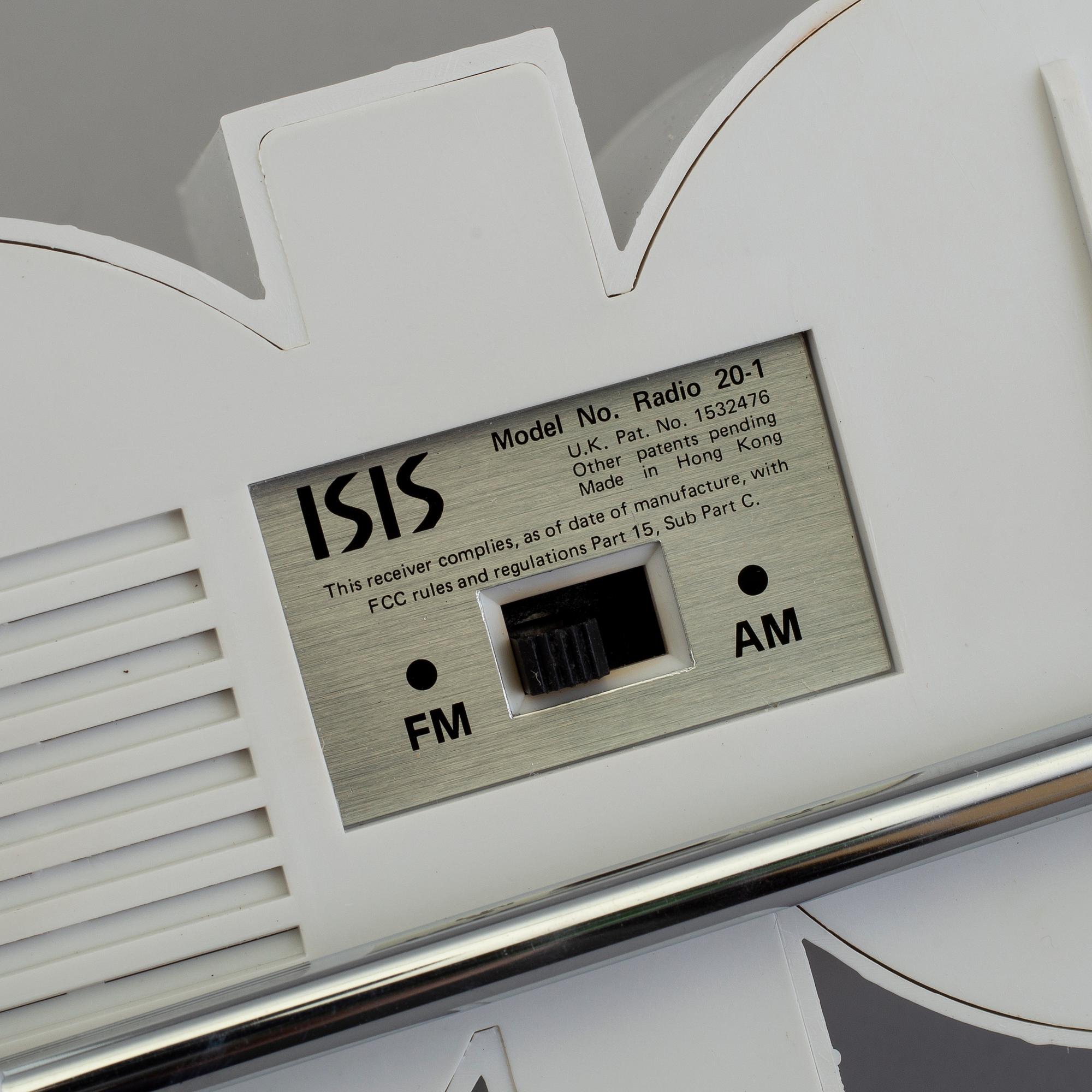 a plastic clock and radio from ISIS, USA, 1980's.