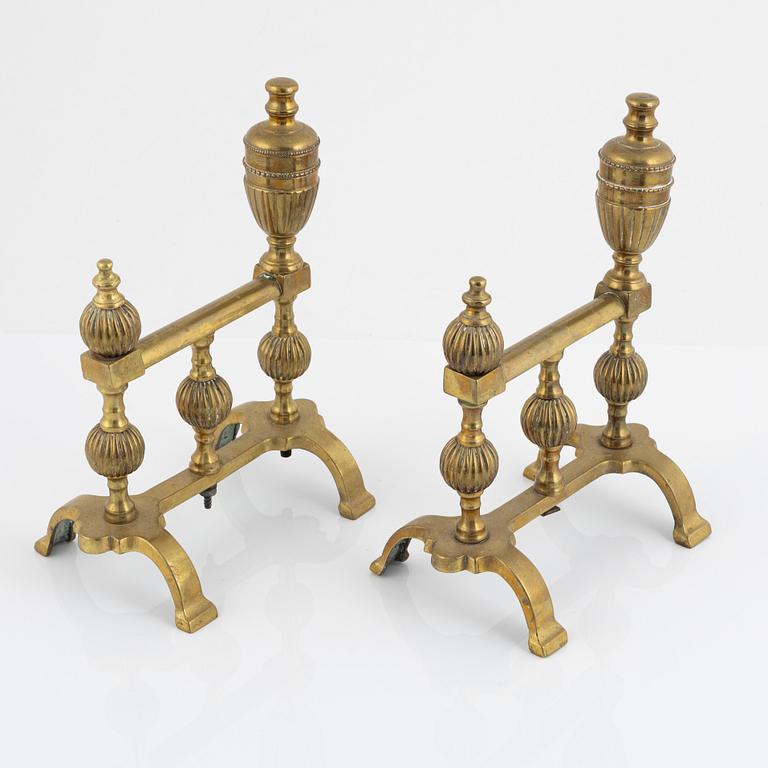 A pair of fire dogs, turn of the 20th century.