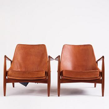 Ib Kofod Larsen, a pair of teak and cognac coloured leather "Sälen" easy chairs, Olof Perssons Fåtöljindustri (OPE), Sweden, 1950-60's.