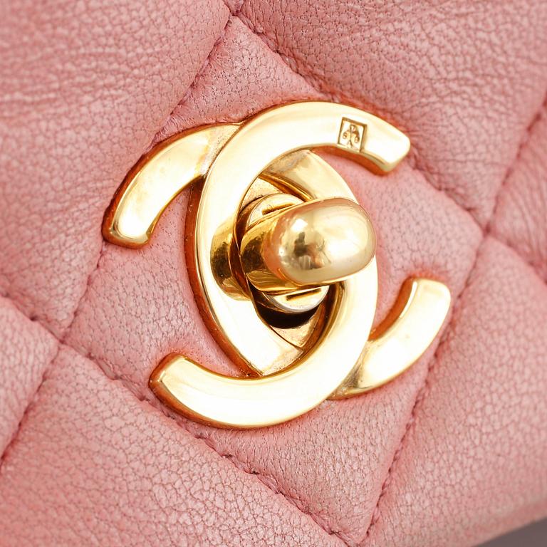 A 'Mini Flap' Chanel lamb skin handbag.