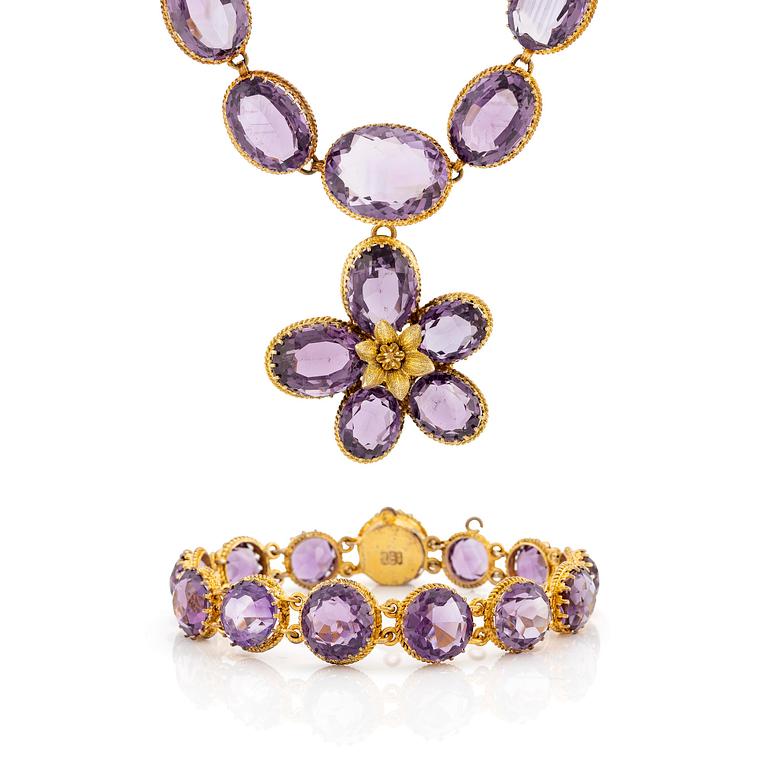 A necklace and a bracelet of gilded silver with faceted amethysts.
