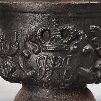 A pair of Swedish cast iron plant pot with the monogram of Queen Hedvig Eleonora, probably 1920's.