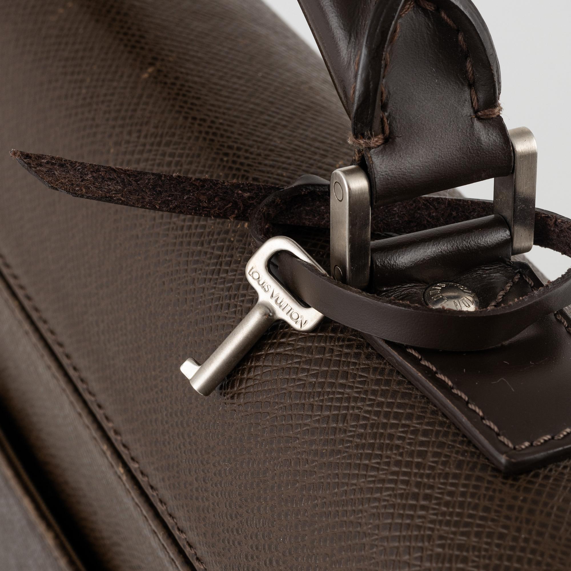 Louis Vuitton, a taiga leather "Neo Robusto" briefcase.