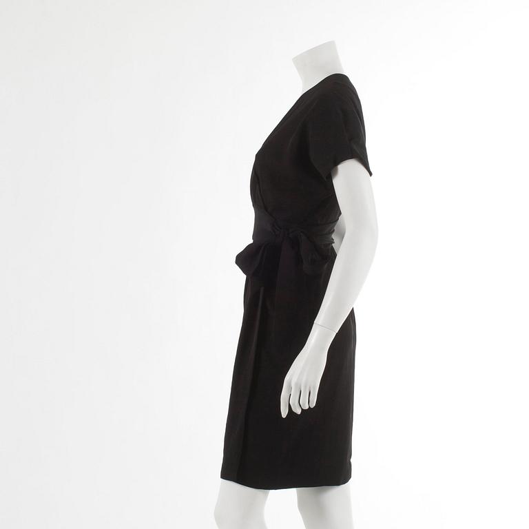 DIANE VON FURSTENBERG, a black wrap dress. Size US 6.